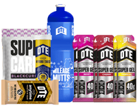 Collection of OTE sports nutrition products including gels, drinks, and bars on a white background.