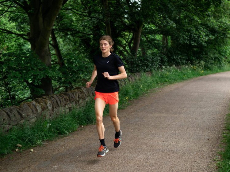 Woman Running Through Trees