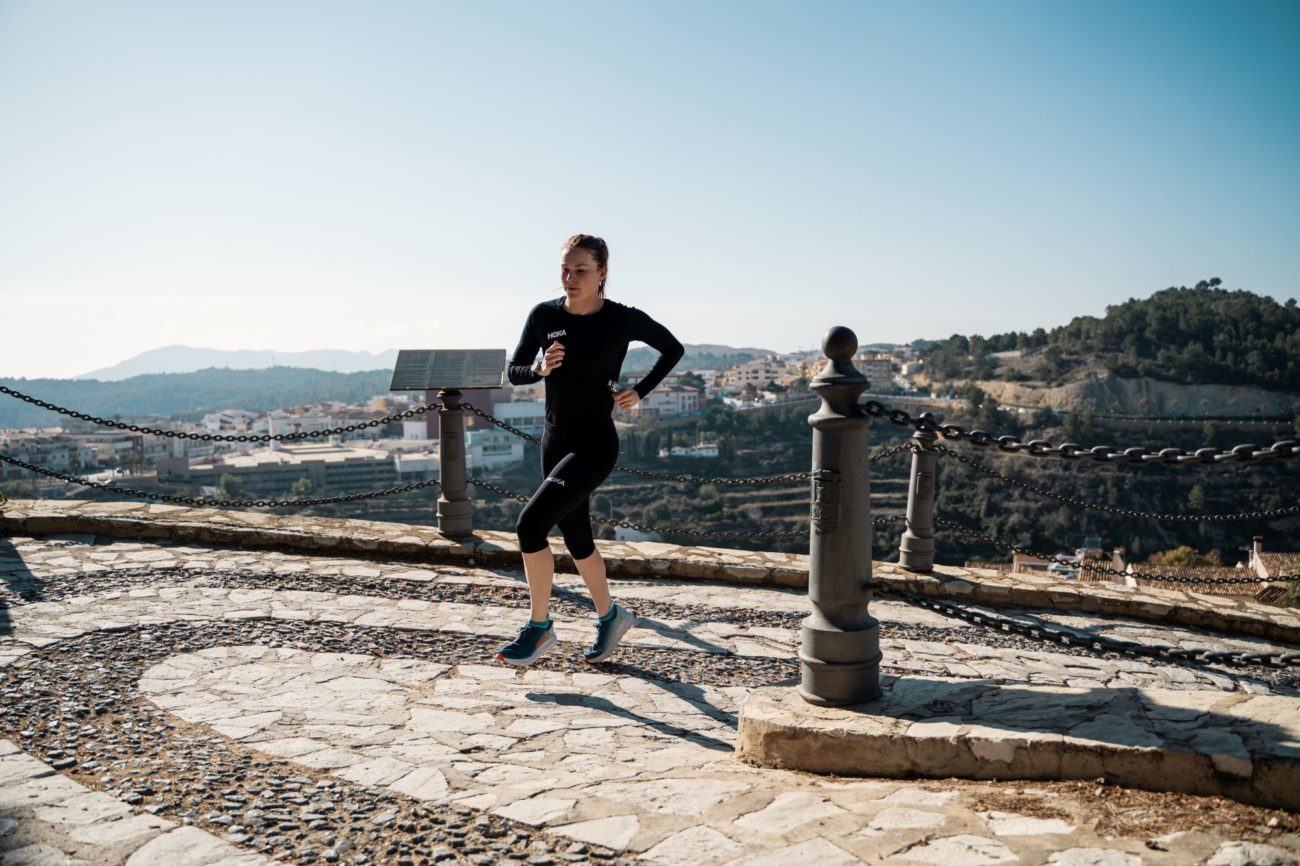 Athlete Running Up A Picturesque Hill