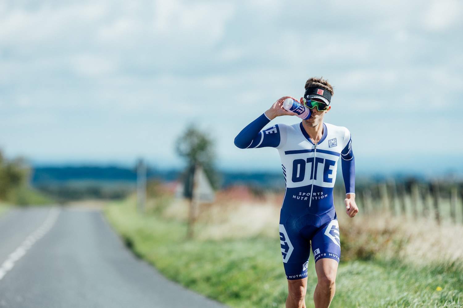 Running with OTE Tri Suit and Bottle